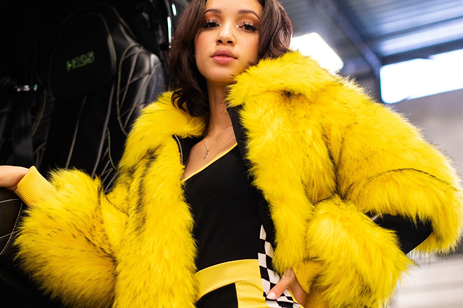 woman wearing yellow faux fur coat