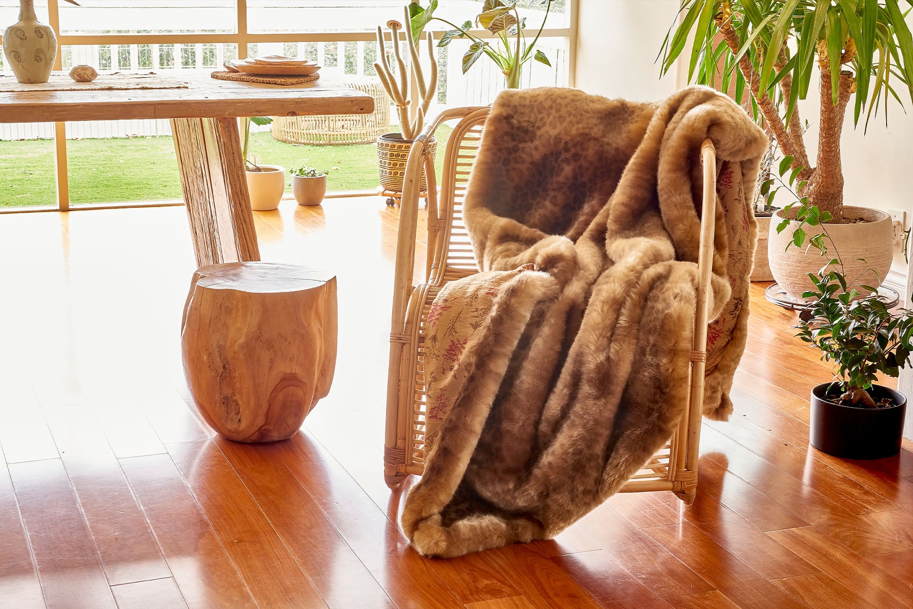 faux fur hanging over chair