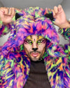 Person wearing a colorful, multicolored leopard print UV blacklight-activated SpiritHood Disco Cat Fake Fur coat, with platful neon color make up to match the coat and spotted animal print over his face, with a neutral background. Easy Halloween Costume Ideas and Halloween Outfits