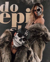 SpiritHoods Grey Wolf Coats featuring a man with skull make up looking into the camera, with a women with a half-skull painted on her face, wearing the SpiritHoods Grey Wolf Classic Fake Fur Jacket for women. Easy Halloween Costume Ideas.