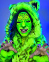 A Woman wearing a bright green SpiritHoods Neon Leopard Fake Fur coat with cat ears and a matching hand painted make up, doing growl face, on a blue background. Lisa Frank inspired Halloween Costume Ideas. Neon Animal Halloween Costume.