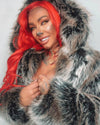 A Woman dressed in SpiritHoods Grey Wolf Hooded Faux Fur Coat with easy halloween wolf make up and halloween wolf fangs. Easy Halloween Costume Ideas & Halloween Outfits