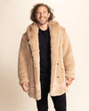 Man wearing a beige cougar faux fur coat against a plain background. SpiritHoods Fall Collection of Men's Faux Fur Coats and top rated Winter Fake Fur Jackets