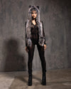 Model wearing a black lace full body bodysuit paired with a SpiritHood Grey Wolf Fake Fur Hood against a textured gray background