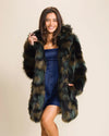 Woman wearing a SpiritHoods top-rated cruelty-free luxury faux fur coat over a blue dress against a beige background