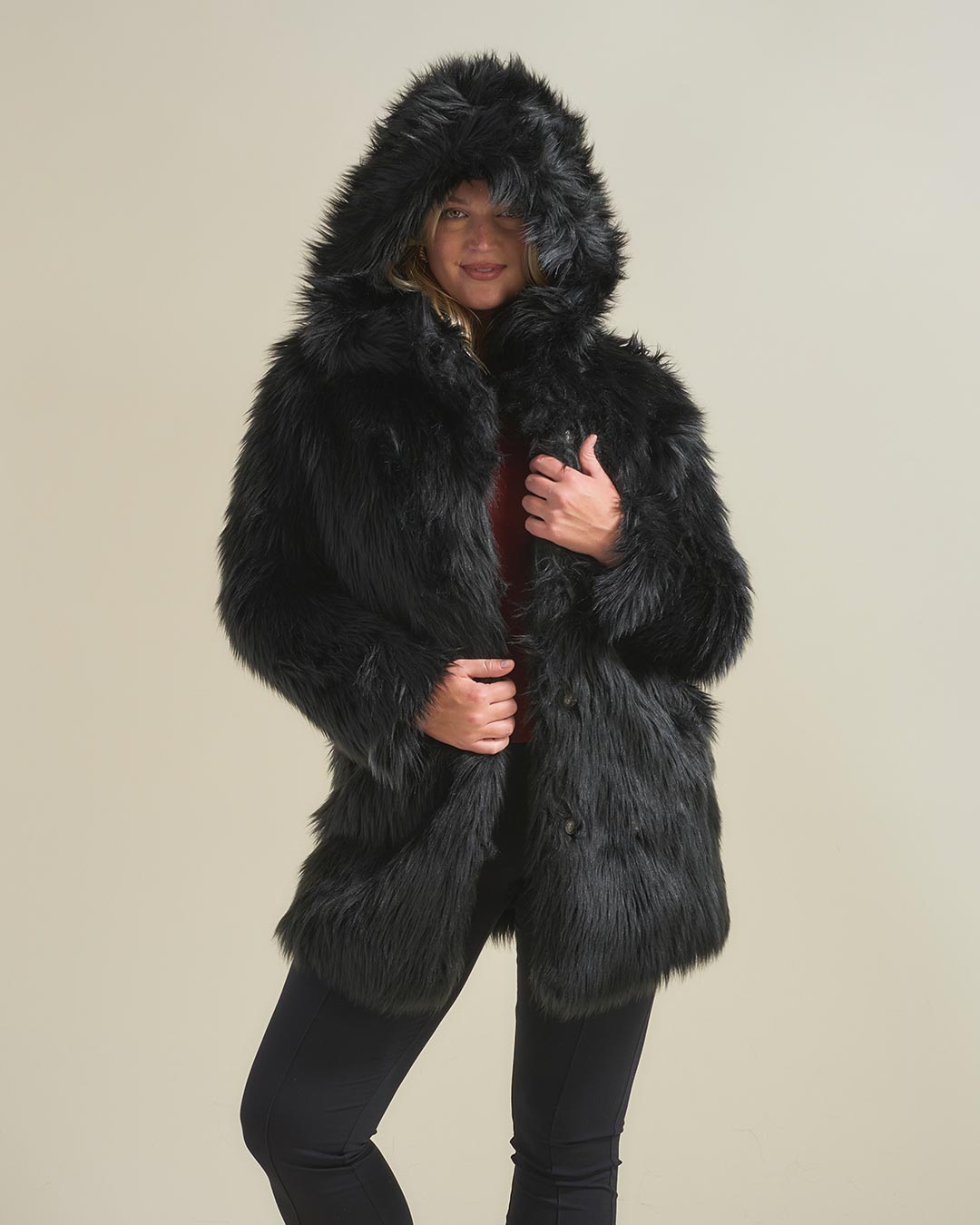 Woman Wearing Black Wolf Hooded Faux Fur Coat