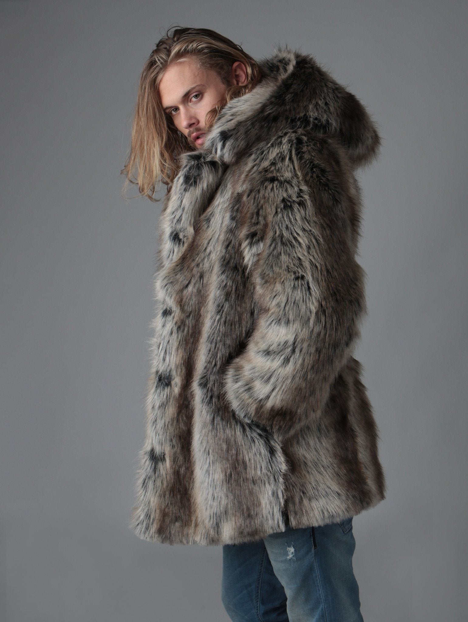 Man wearing Grey Wolf Hooded Faux Fur Coat, side view 1