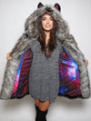 Woman wearing faux fur BlackMilk Galaxy Grey Wolf Coat, front view 1