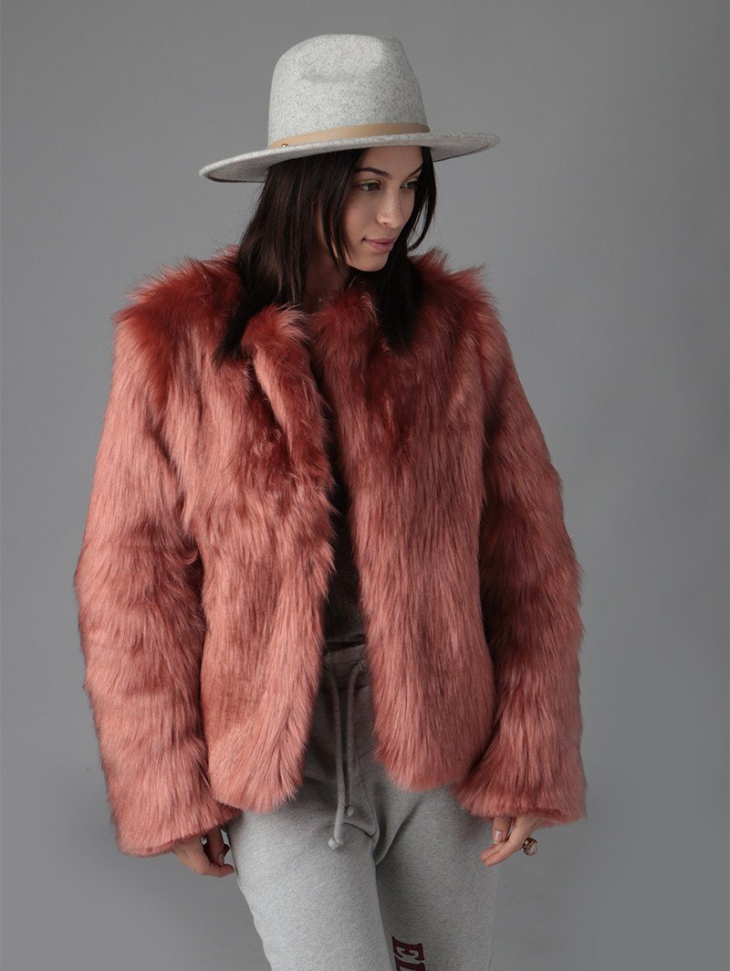 Woman Wearing Faux Fur Bomber SpiritHood in Rose Quartz