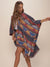 Woman wearing Dire Wolf Fabric Poncho, side view 1