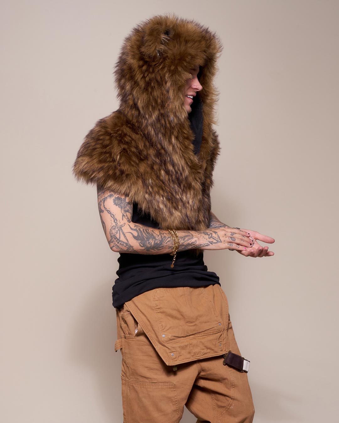 Man wearing Grizzly Bear Collector Edition Faux Fur Shawl, side view 1