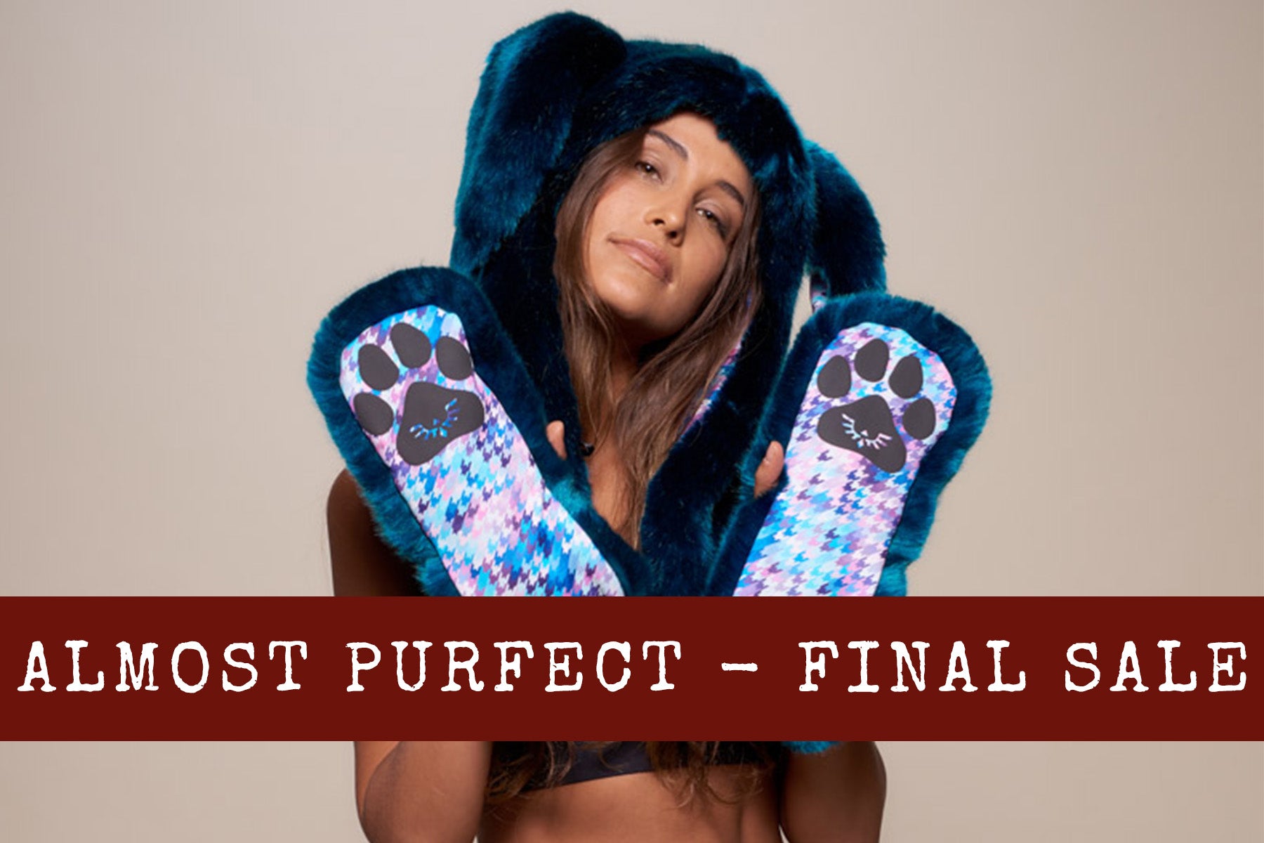 woman wearing faux fur hood for the almost purfect final sale