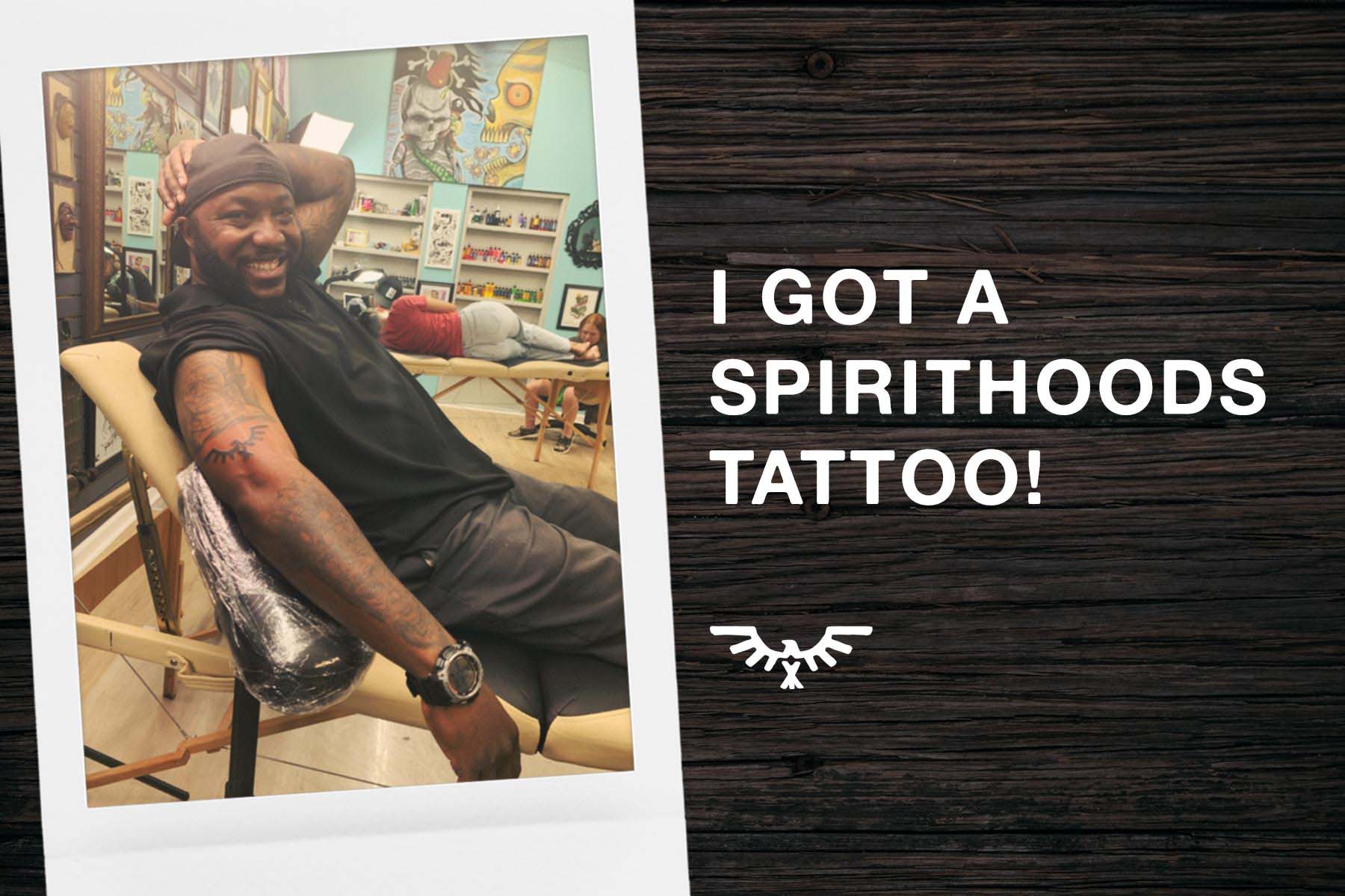 man showing off new spirithoods logo tattoo