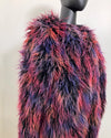Multicolored fake fur bomber jacket on a mannequin against a plain background