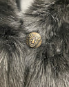 Close-up of a faux fur with a custom  leopard button.