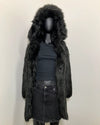 Black faux fur coat with hood on a mannequin against a white background. SpiritHoods Online Sample Sale Style: Hooded Faux Fur Coat in Black Wolf size X-SMALL.