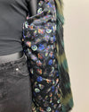 Colorful multi-animal faces with neon glow as the lining within the jacket
