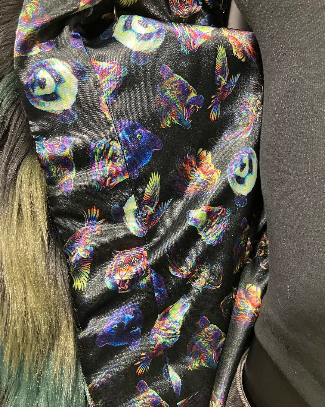 Colorful multi-animal neon pattern on a black background