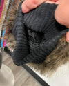 Twisted material inside left arm sleeve.