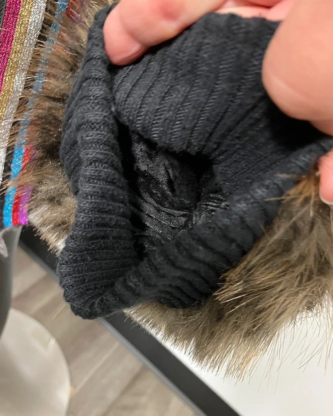 Twisted material inside left arm sleeve.
