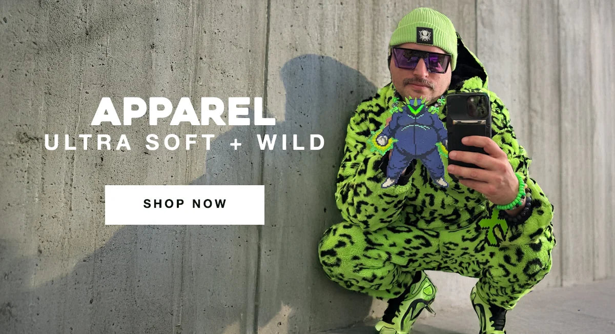 Man crouching in neon green fuzzy printed outfit with a matching beanie and pixel art patch, reflecting ultra-soft wild apparel style.