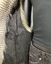 close-up photo of the black snakeskin inspired lining in the SpiritHoods Online Sample Sale Style: Hooded Faux Fur Vest in Alaskan Hawk - Size Medium.
