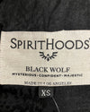 close-up photo of the Made in los Angeles Black Wolf Coat necklabel in XS sizing