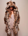 A Woman wearing SpiritHoods Best Selling Leopard print faux fur coat for women against a plain background. Custom Made Fall Winter Coats in Animal Print Fake Fur