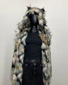 Mannequin wearing a fake fur coat with oversized hood with a neutral background