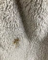 close-up phot of the stain on the grey fox robe for spirithoods online sample sale