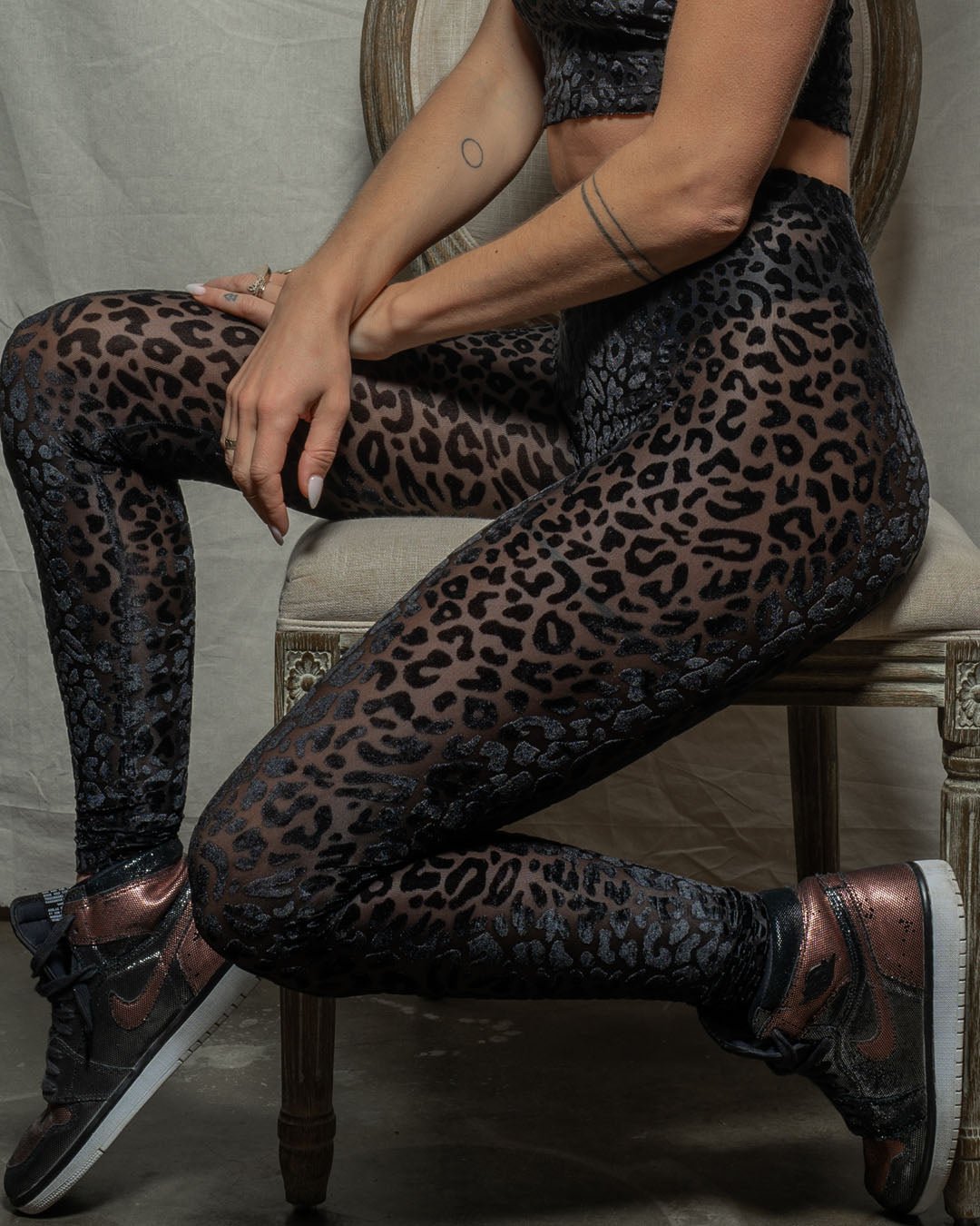 Leopard print black leggings for women.