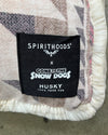 Label on a product with 'Spirithoods' and 'Gone to the Snow Dogs' branding.