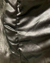 Close-up of a shiny, poly-satin fabric showing the inner secret zipper pocket placement. | SpiritHoods Online Sample Sale Style Black Panther in Size SMALL