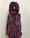 Multicolored fake fur vest on a mannequin against a plain background