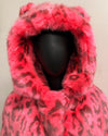 Mannequin wearing a bright pink faux fur coat with black leopard print pattern on a plain background. Showing the Smaller than standard ears on the top of the coats hood