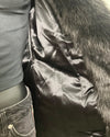 Close-up of the poly-satin black lining in the Black Panther Classic Faux Fur Coat in size SMALL