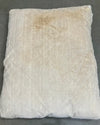 Dirty pillow on a gray background