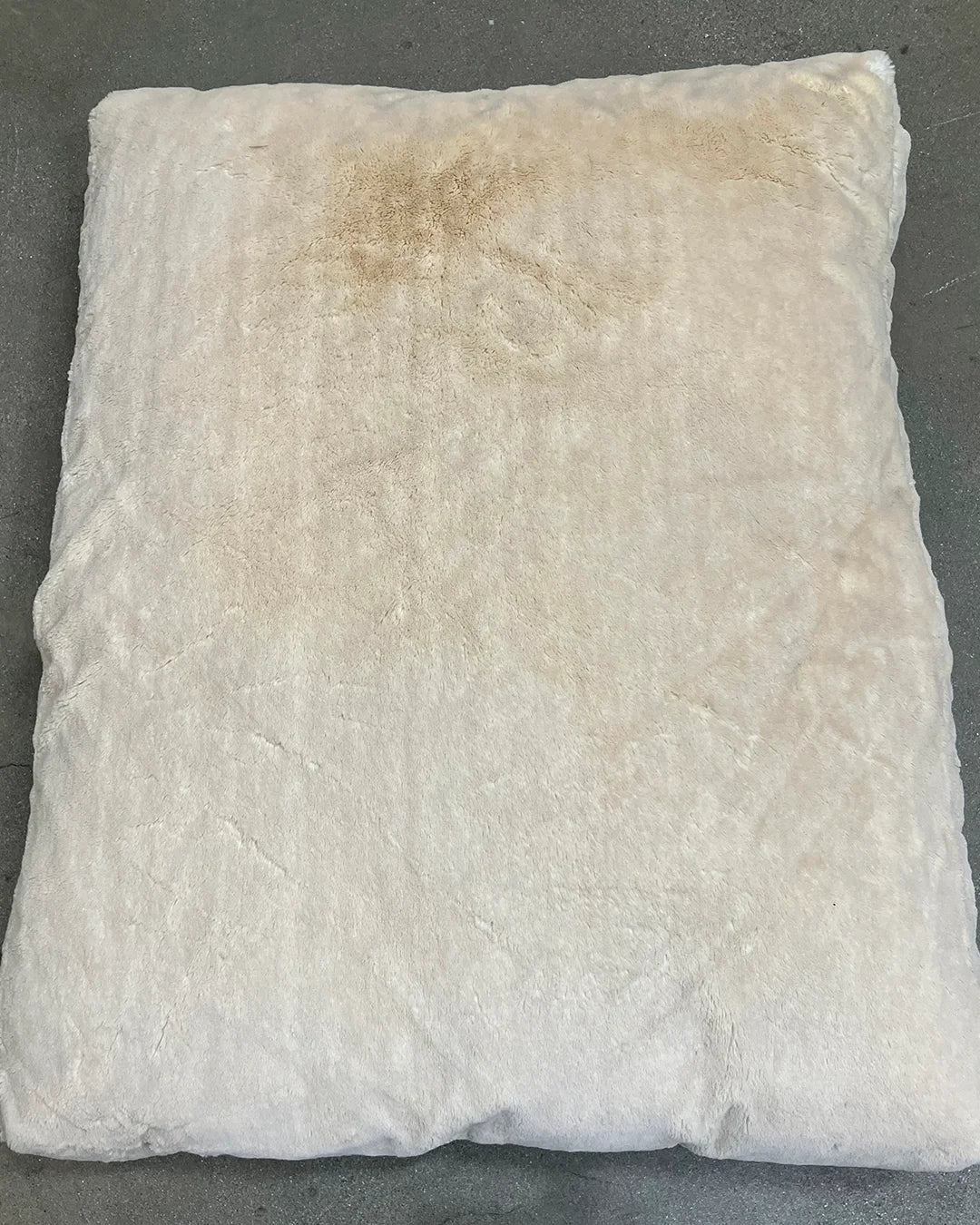 Dirty pillow on a gray background