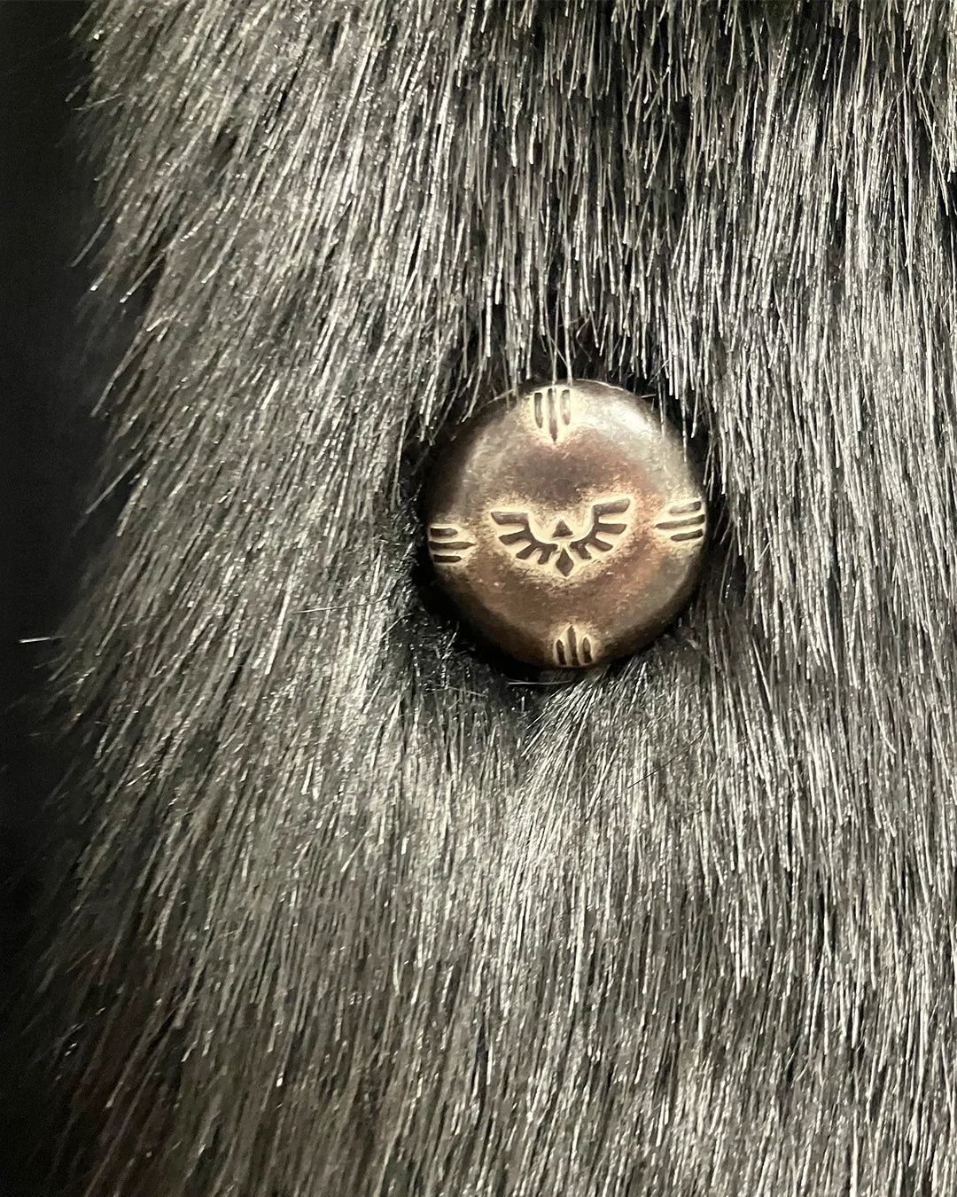 Bronze button with SpiritHoods OG Logo design embedded in black fake fur. | SpiritHoods Online Sample Sale Style Black Panther in Size SMALL