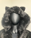 Faux Fur hood with cat ears on a neutral background