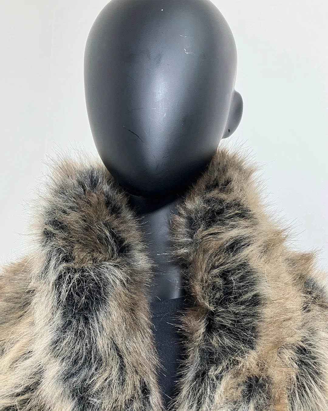 Faux Fur collar on a mannequin with a plain background