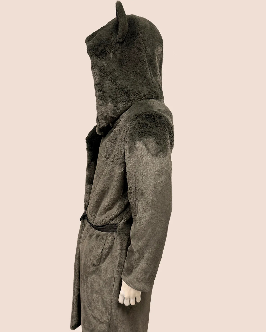 Dark gray hooded coat on a beige background