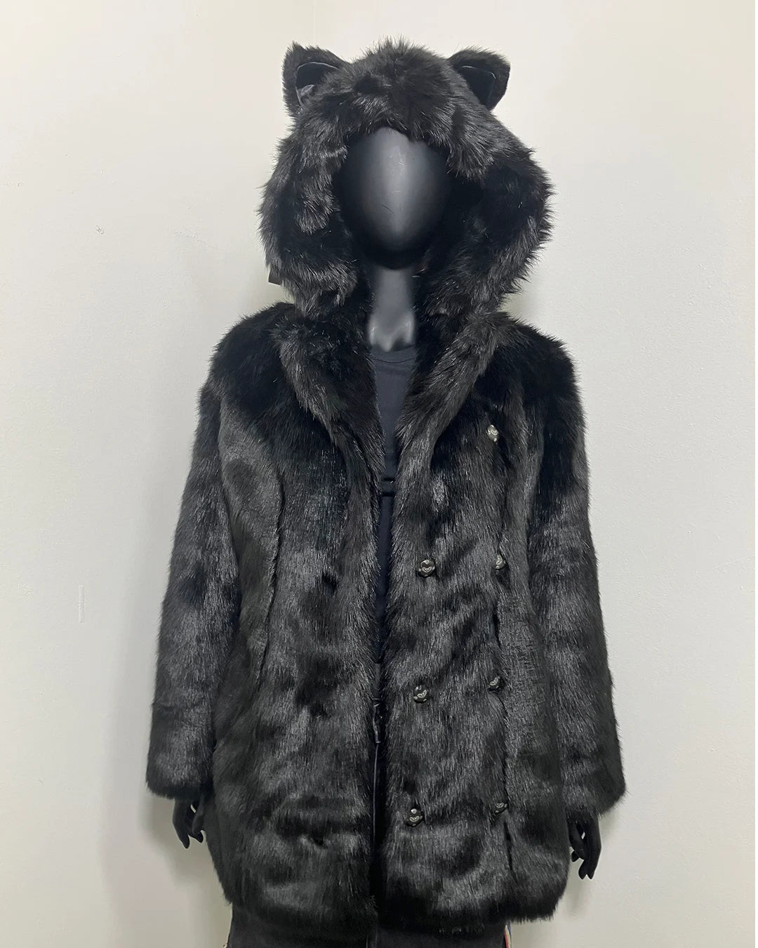 Dark black fake fur coat with a oversized hood with feline ears on a mannequin against a white background | SpiritHoods Online Sample Sale Style Black Panther in Size SMALL