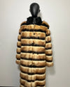 Faux Fur coat with a striped pattern on a mannequin against a white background