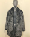 mannequin wearing the all black panther fake fur jacket open and relaxed with the collar down.  Showcasing the silky ultra-soft fake fur. SpiritHoods Online Sample Sale Style: Collared Faux Fur Coat in Black Panther - Size MEDIUM.