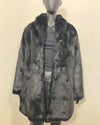Mannequin wearing a black fur-free faux fur coat with a neutral background. SpiritHoods Online Sample Sale Style: Collared Faux Fur Coat in Black Panther - Size MEDIUM.