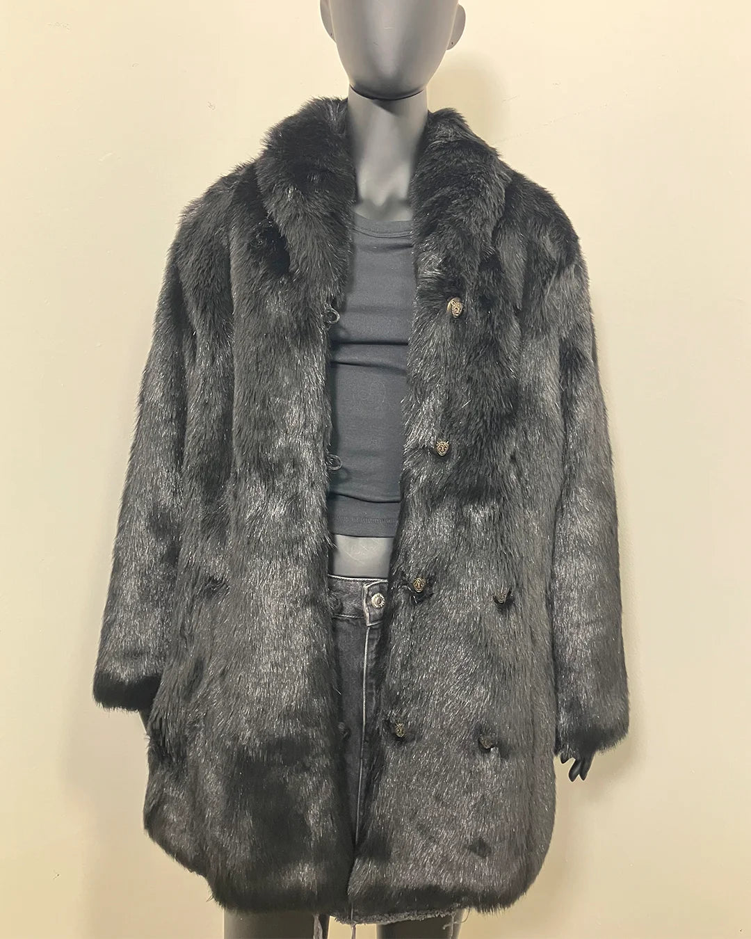 Mannequin wearing a black fur-free faux fur coat with a neutral background. SpiritHoods Online Sample Sale Style: Collared Faux Fur Coat in Black Panther - Size MEDIUM.