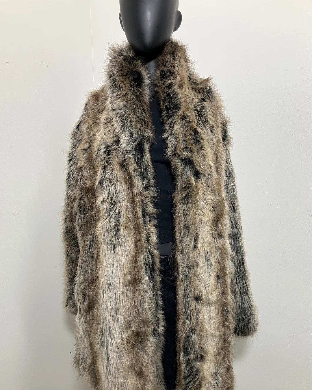 fake fur grey wolf jacket on a mannequin against a white background