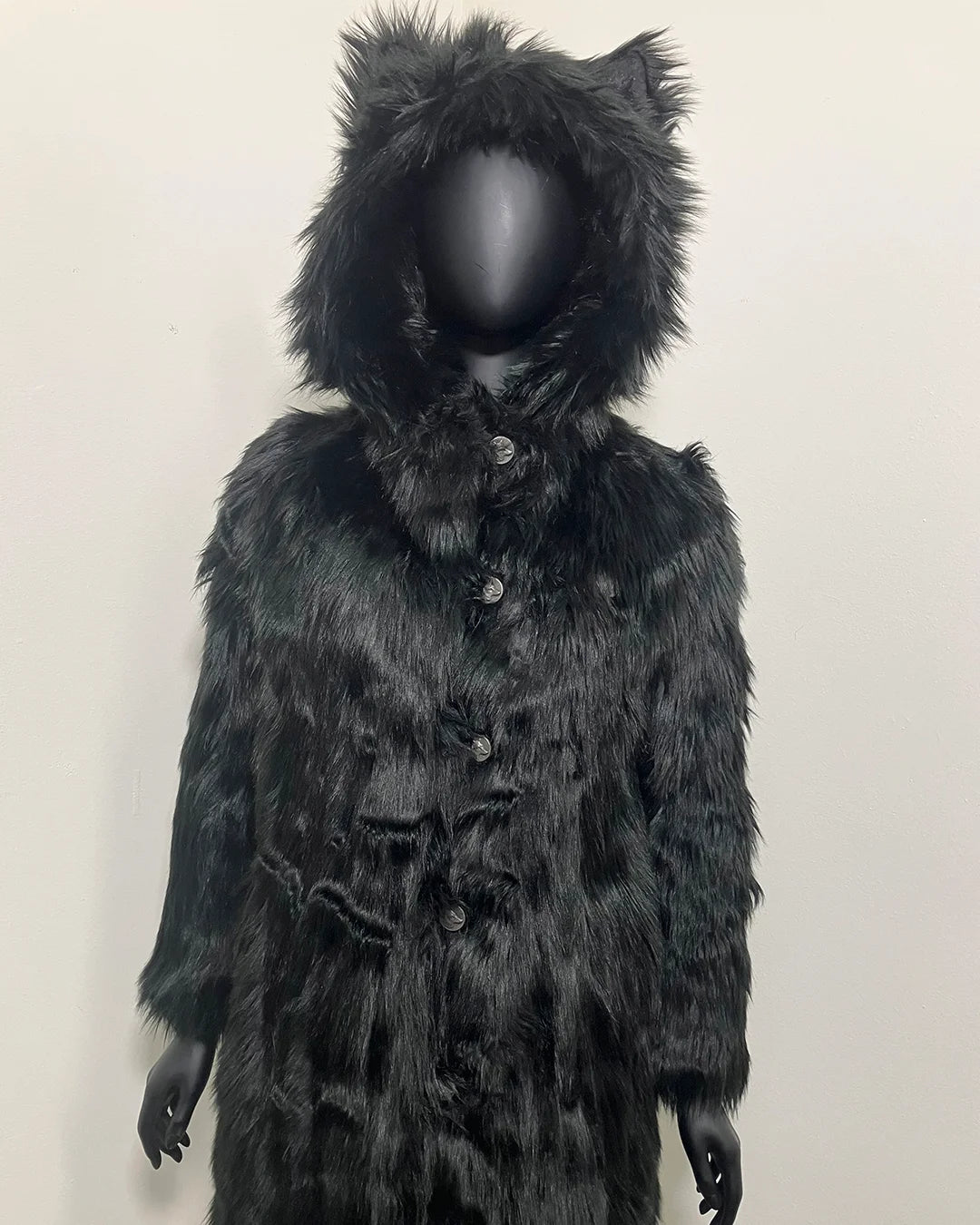 Mannequin wearing a black faux fur coat with a hood on a plain background. SpiritHoods XXS Sizing Black Wolf Online Sample Sale Style