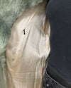 Close-up of the inner hummingbird fake fur jacket lining and the inner secret pocket 
